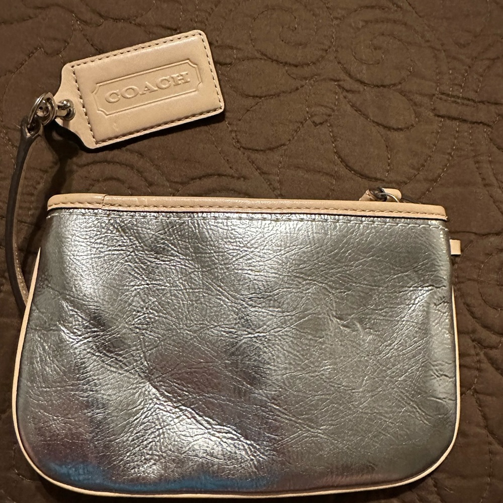 Very good condition medium size coach satchel never been used.  no pockets.